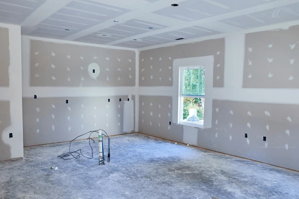 Drywall plastering mudded screw joints and seams